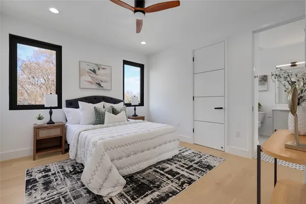 an outdoor space with seating area and car parked