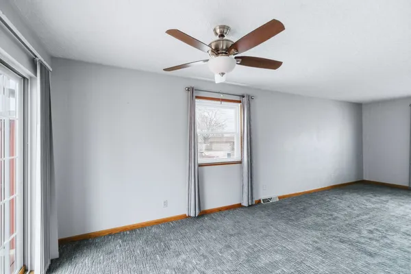 a kitchen with stainless steel appliances a refrigerator stove and microwave