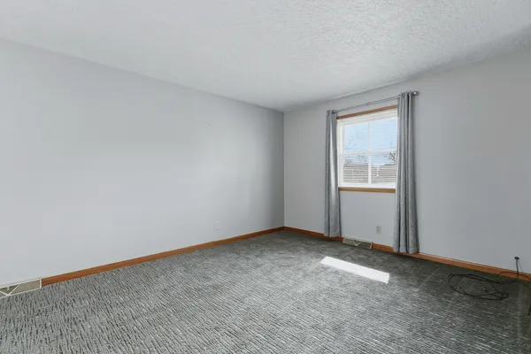 a kitchen with stainless steel appliances a stove sink microwave and refrigerator