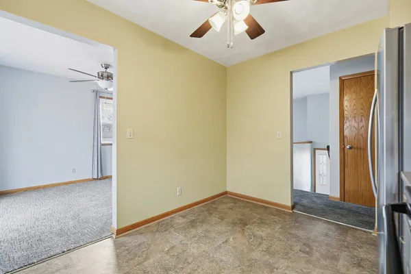 a bedroom that has a bed and a window