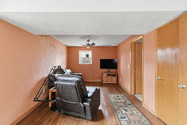 a bathroom with a sink toilet and mirror