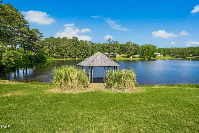 a view of a lake with a garden