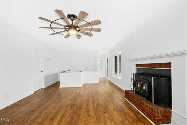 a view of a livingroom with wooden floor