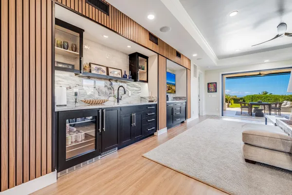 a kitchen with stainless steel appliances granite countertop a sink and cabinets