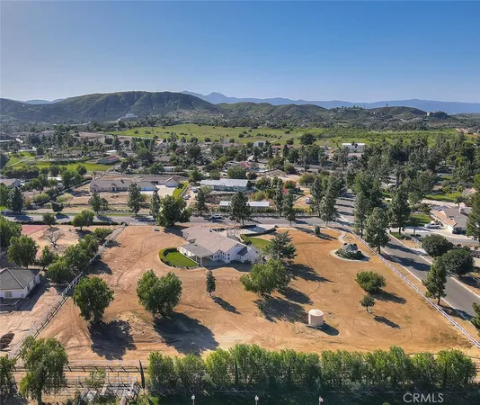 a view of a city with mountains in the background