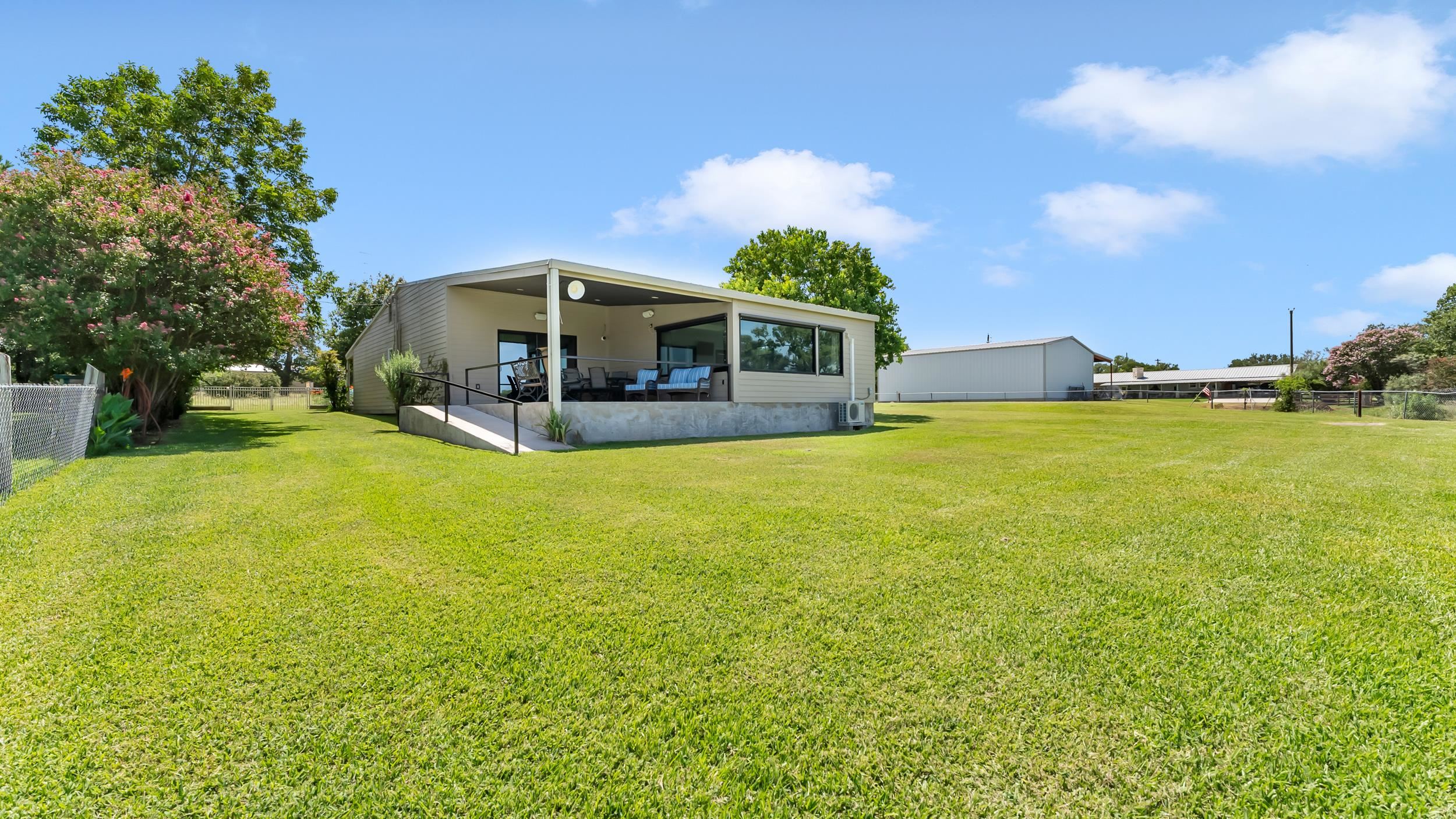 1570 Breezeway Tow, TX 78672 - Photo 23 of 30 a view of a house with yard and porch