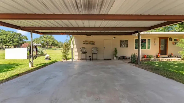 a view of a porch with garden