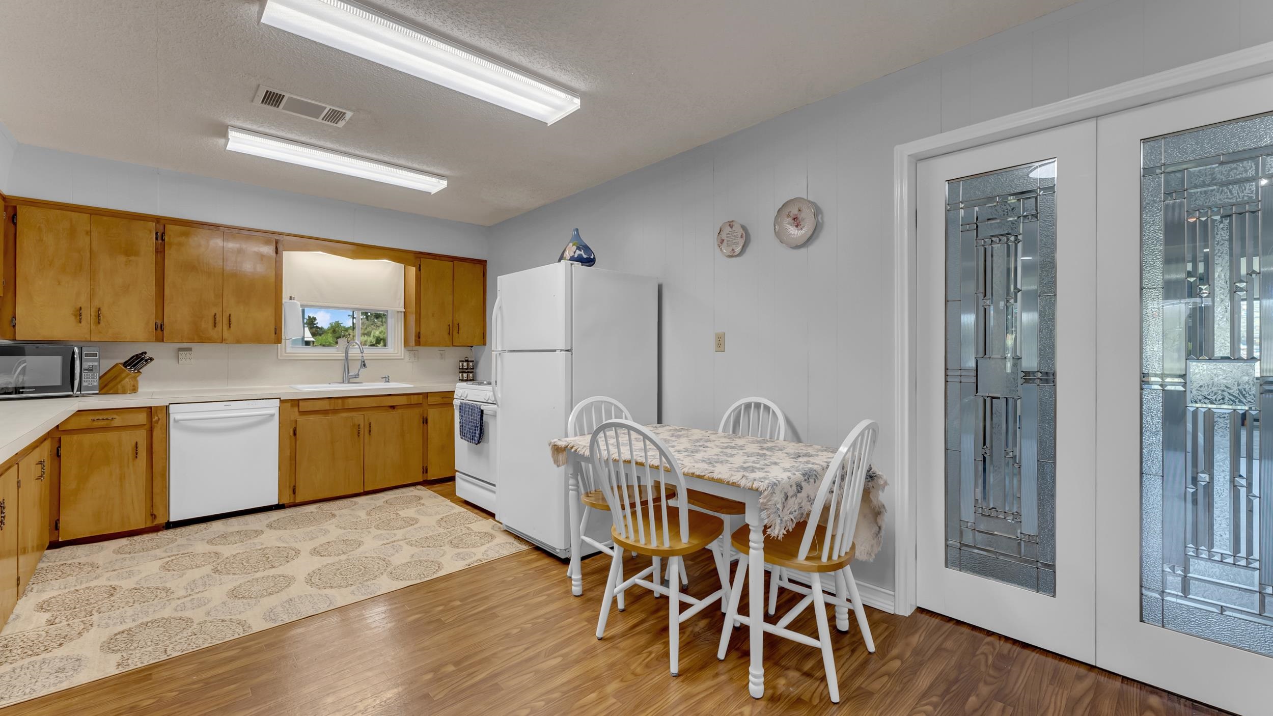 1570 Breezeway Tow, TX 78672 - Photo 6 of 30 a view of a dining room with furniture and wooden floor