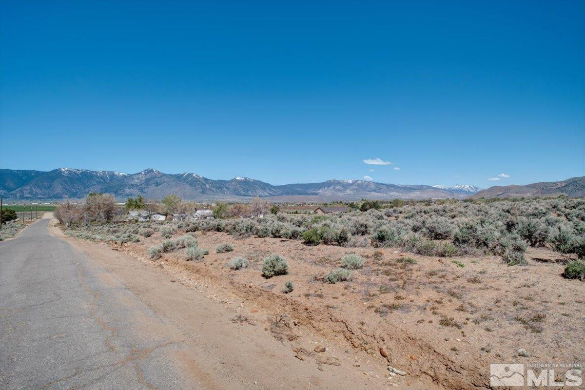 1700 Sunrise Pass Road Minden, NV 89423 - Photo 12 of 17 a view of a beach with a mountain in the background