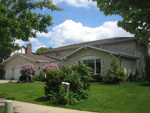 a view of a house with a garden