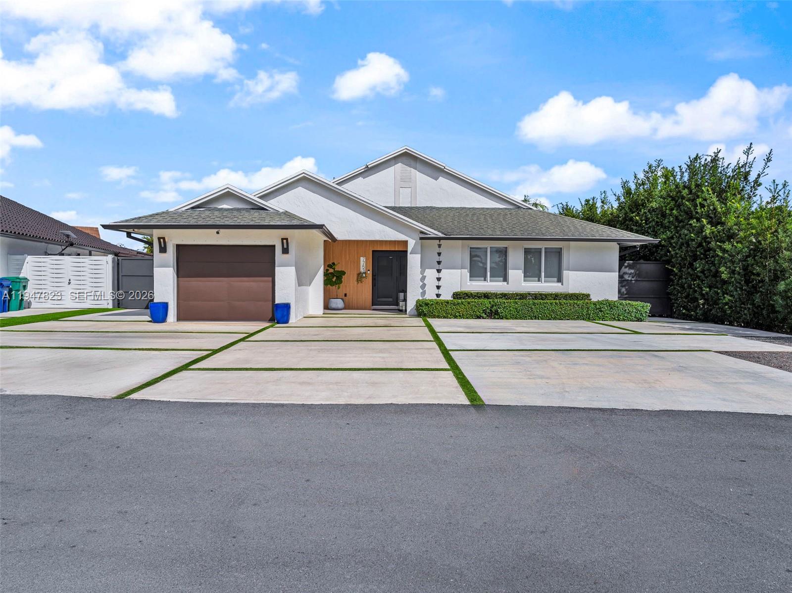 a house view with a garden space