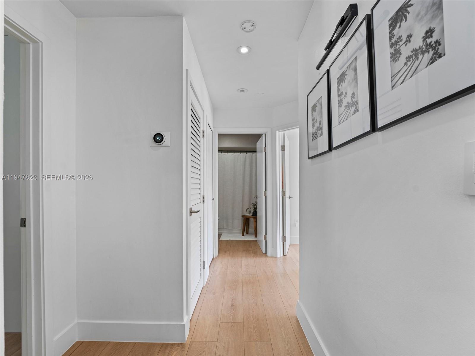 7753 Northwest 189th Street, Unit 1 Hialeah, FL 33015 - Photo 14 of 30 a view of a hallway with elevator