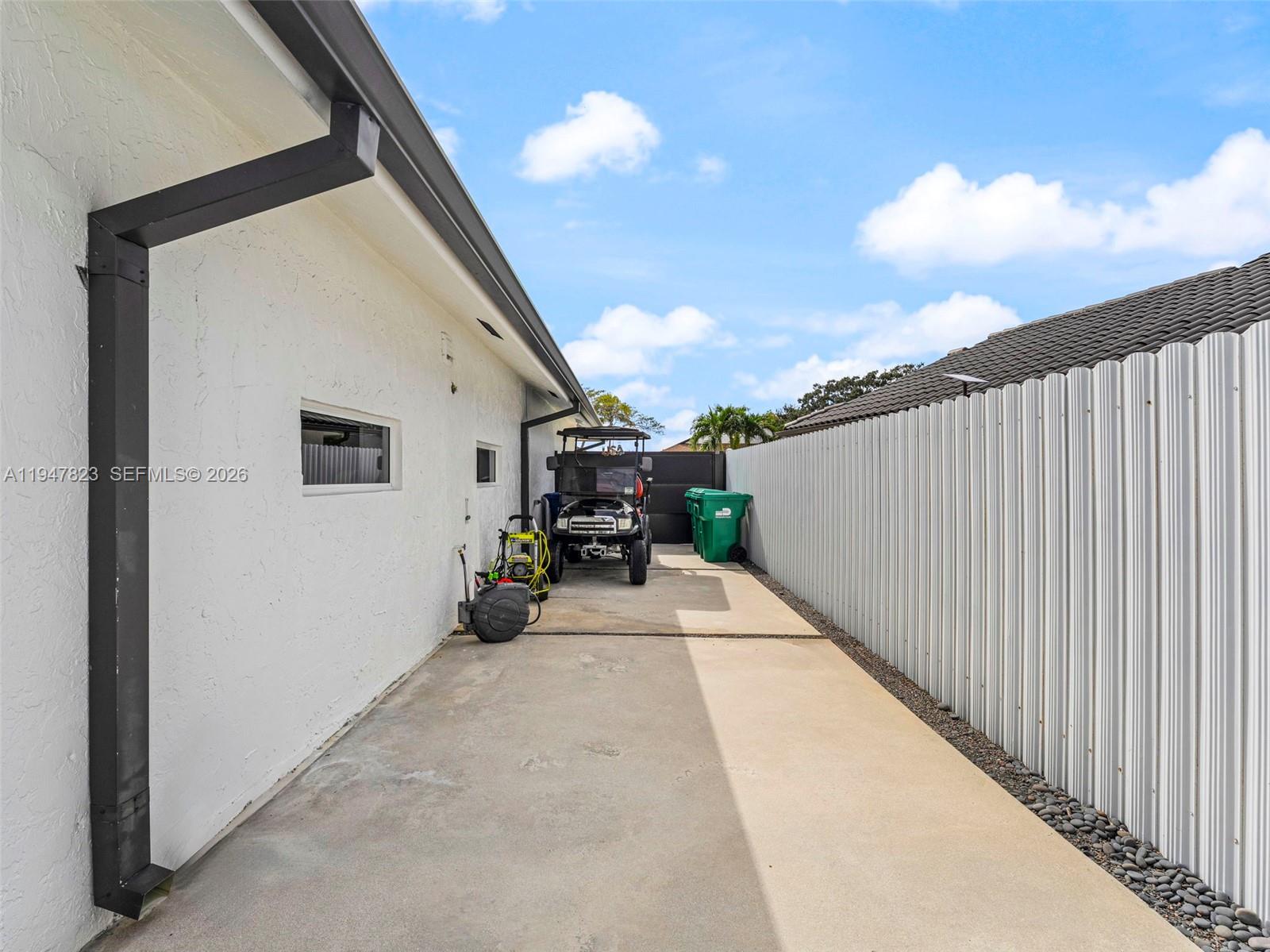 7753 Northwest 189th Street, Unit 1 Hialeah, FL 33015 - Photo 28 of 30 a view of a terrace with sky view