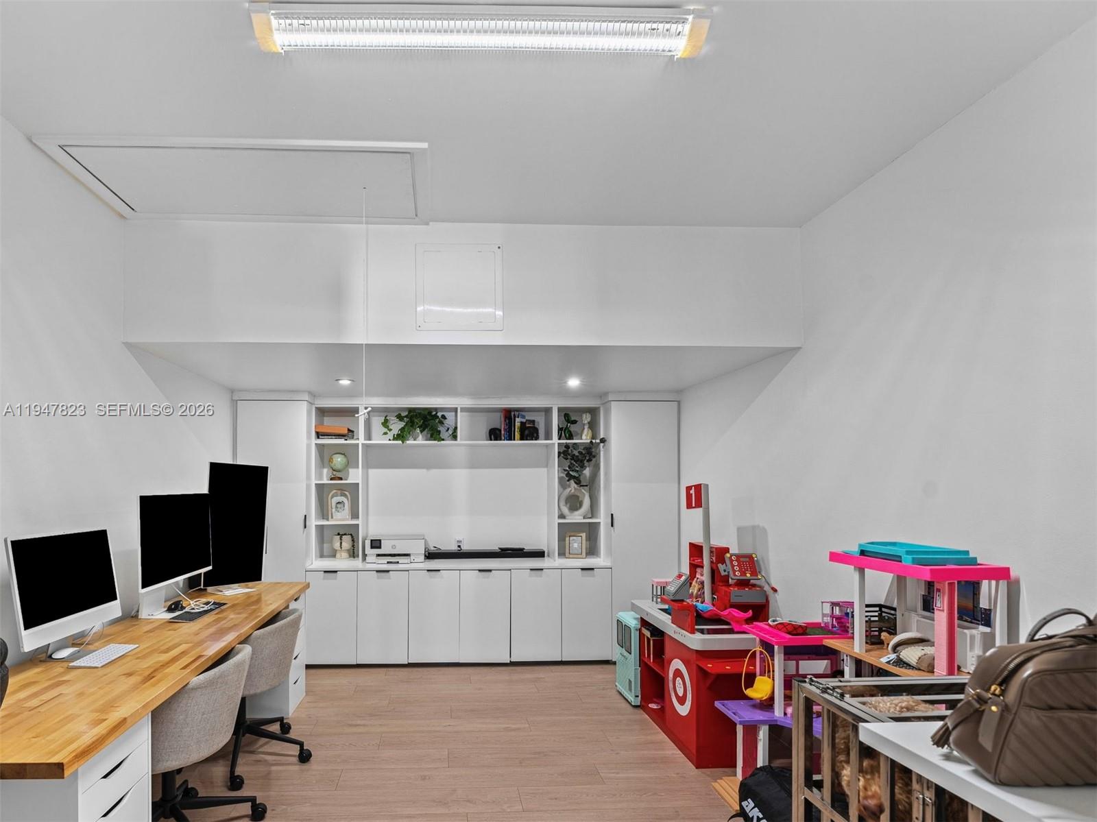 7753 Northwest 189th Street, Unit 1 Hialeah, FL 33015 - Photo 30 of 30 a very nice looking room with many windows