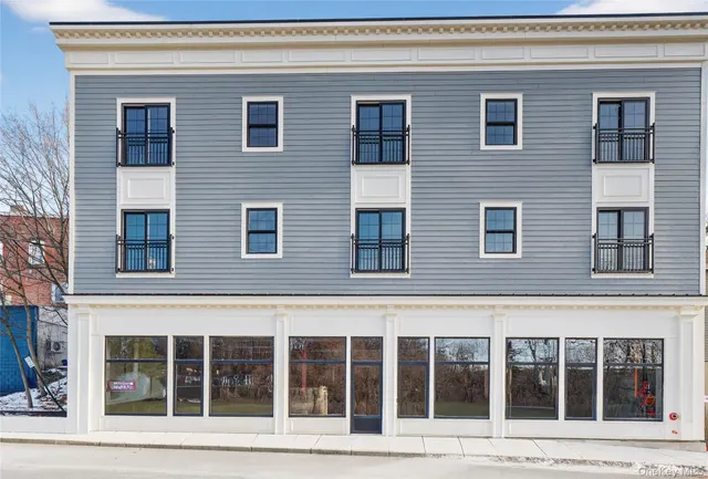 a front view of a building with street