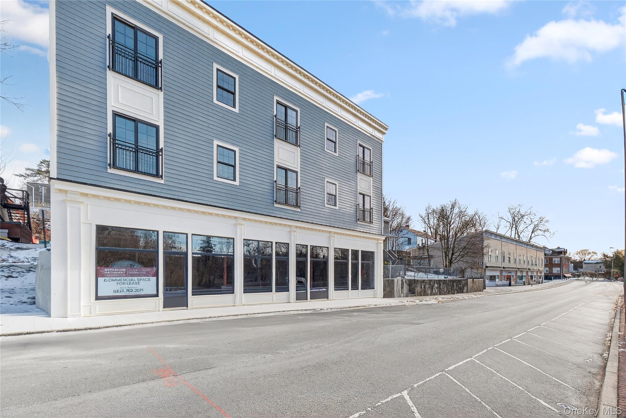 10 Market Street, Unit J Wappingers Falls, NY 12590 - Photo 17 of 18 a front view of a building with street