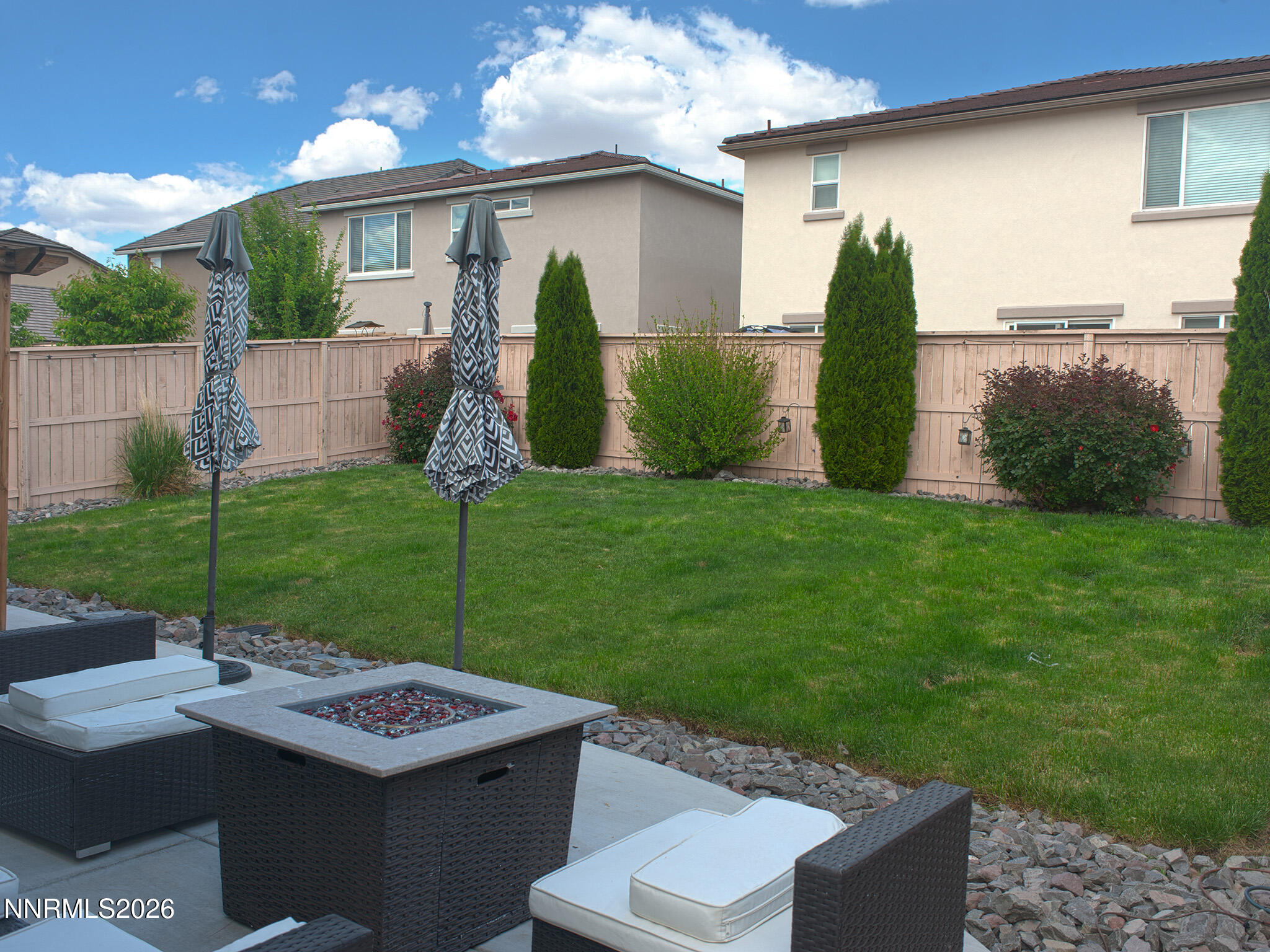 9766 Pachuca Drive Reno, NV 89521 - Photo 54 of 59 a view of a house with backyard and a patio