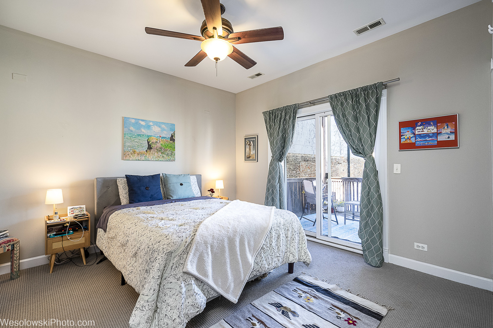 3042 North Oakley Avenue, Unit 2S Chicago, IL 60618 - Photo 12 of 19 a bedroom with a bed and a large window