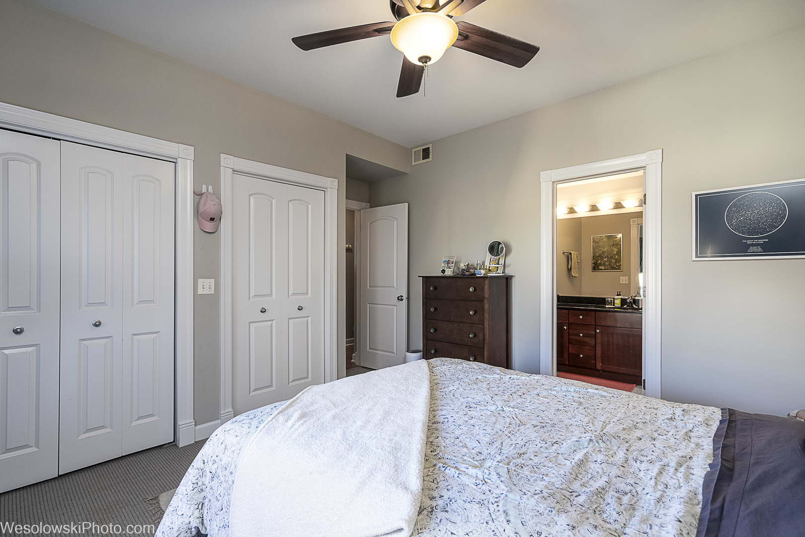 3042 North Oakley Avenue, Unit 2S Chicago, IL 60618 - Photo 16 of 19 a bedroom with a bed and a dresser
