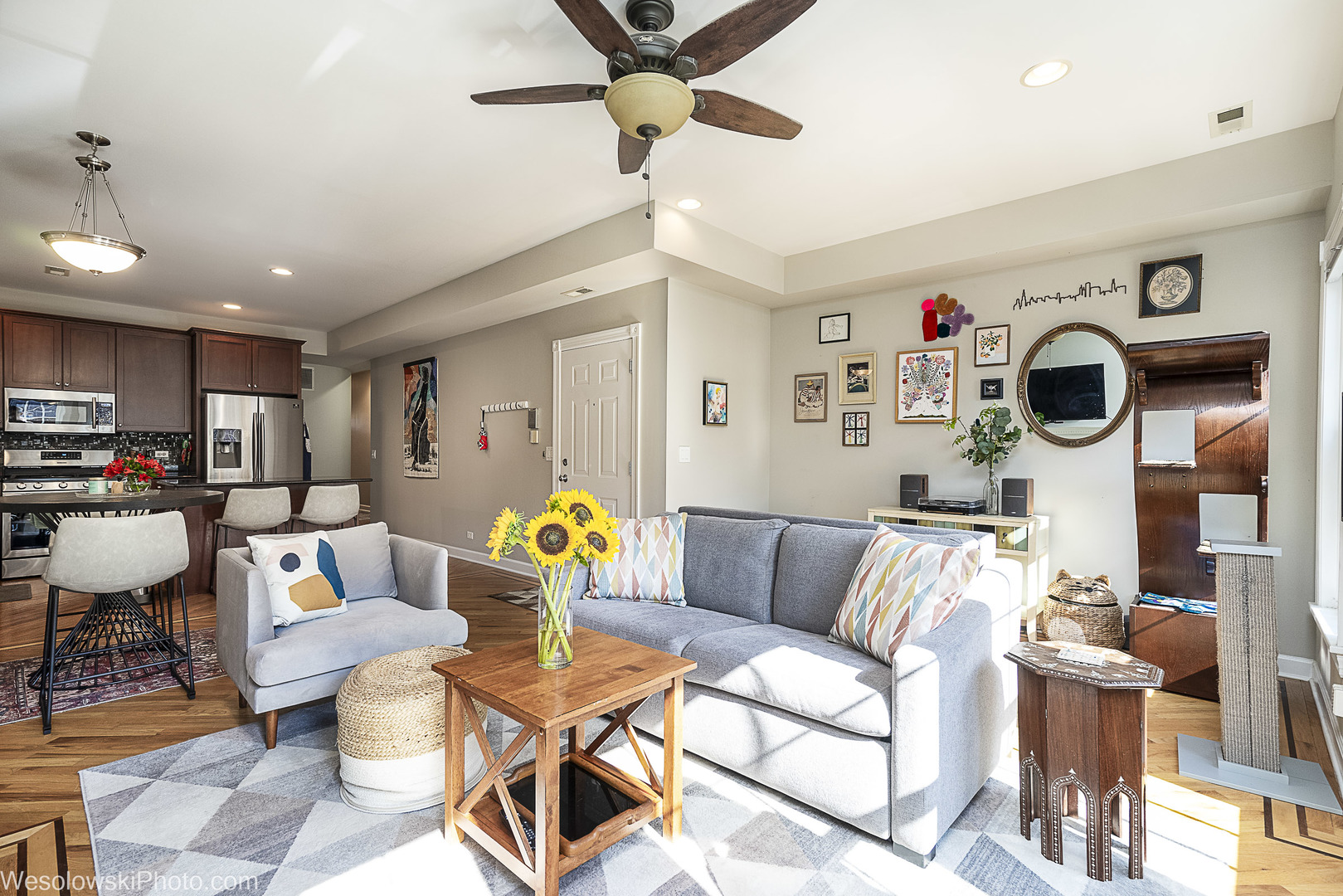 3042 North Oakley Avenue, Unit 2S Chicago, IL 60618 - Photo 2 of 19 a living room with furniture and kitchen view
