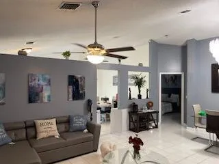 a bathroom with a toilet sink and shower