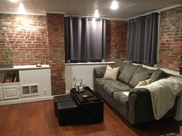 a bedroom with a bed and dresser