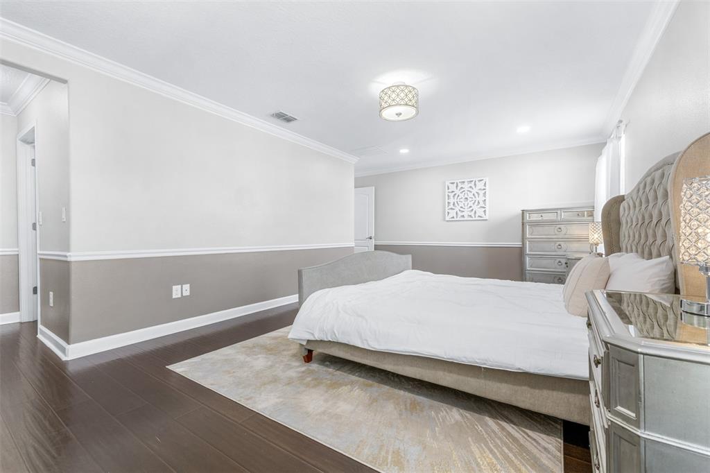 1762 Hadden Hall Place Trinity, FL 34655 - Photo 21 of 49 a bedroom with a bed and window