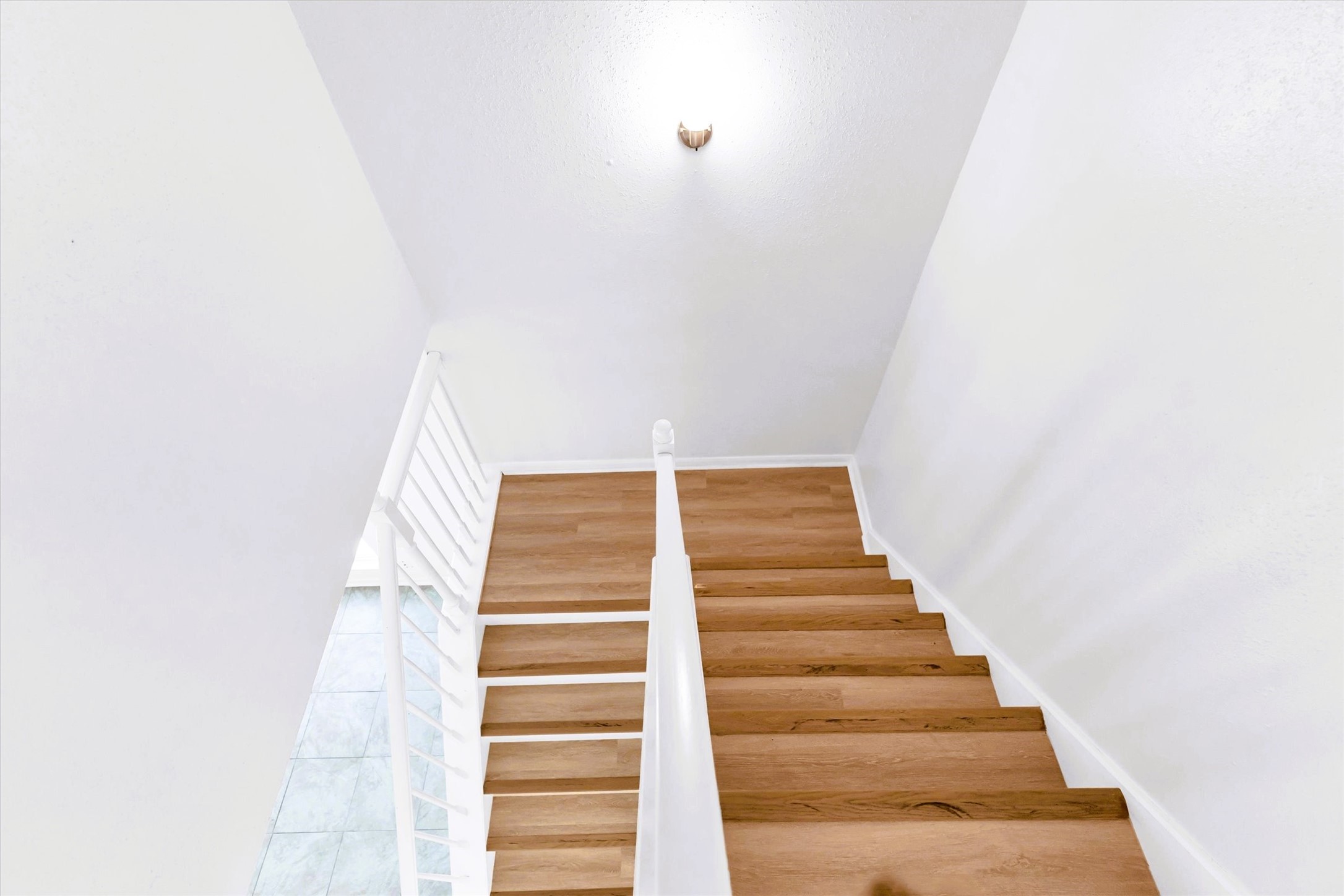 1101 Wilson Drive Rosenberg, TX 77471 - Photo 19 of 38 GREAT LUXURY VINYL PLANK ON STAIRS! NO CARPET ANYWHRE!