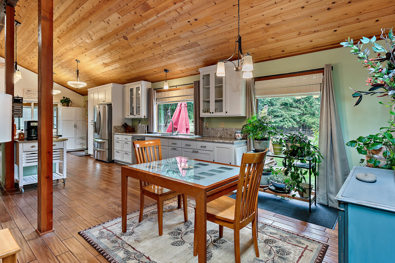 9250 Wagner Creek Road Talent, OR 97540 - Photo 5 of 52 Dining area with views of surrounding woods