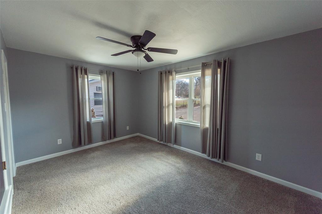 2339 Southwest County Road 3110 Mount Vernon, TX 75457 - Photo 17 of 31 a view of a livingroom with a ceiling fan and window