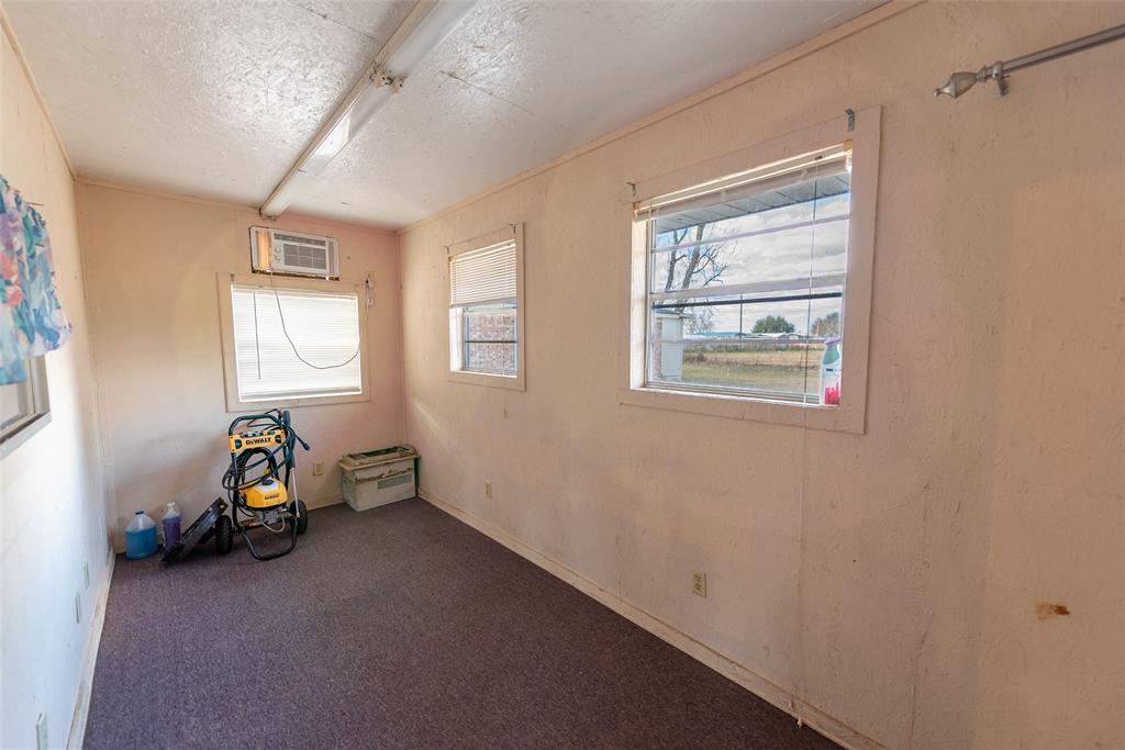 2339 Southwest County Road 3110 Mount Vernon, TX 75457 - Photo 24 of 31 a view of room with window and wooden floor