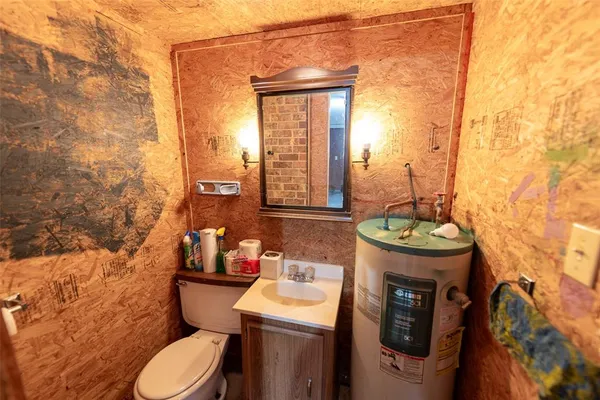 a view of a hallway with a refrigerator