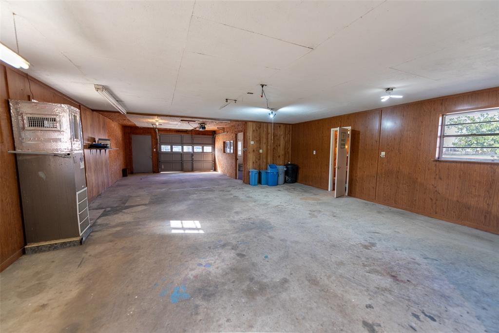 2339 Southwest County Road 3110 Mount Vernon, TX 75457 - Photo 27 of 31 a view of a hallway with a refrigerator
