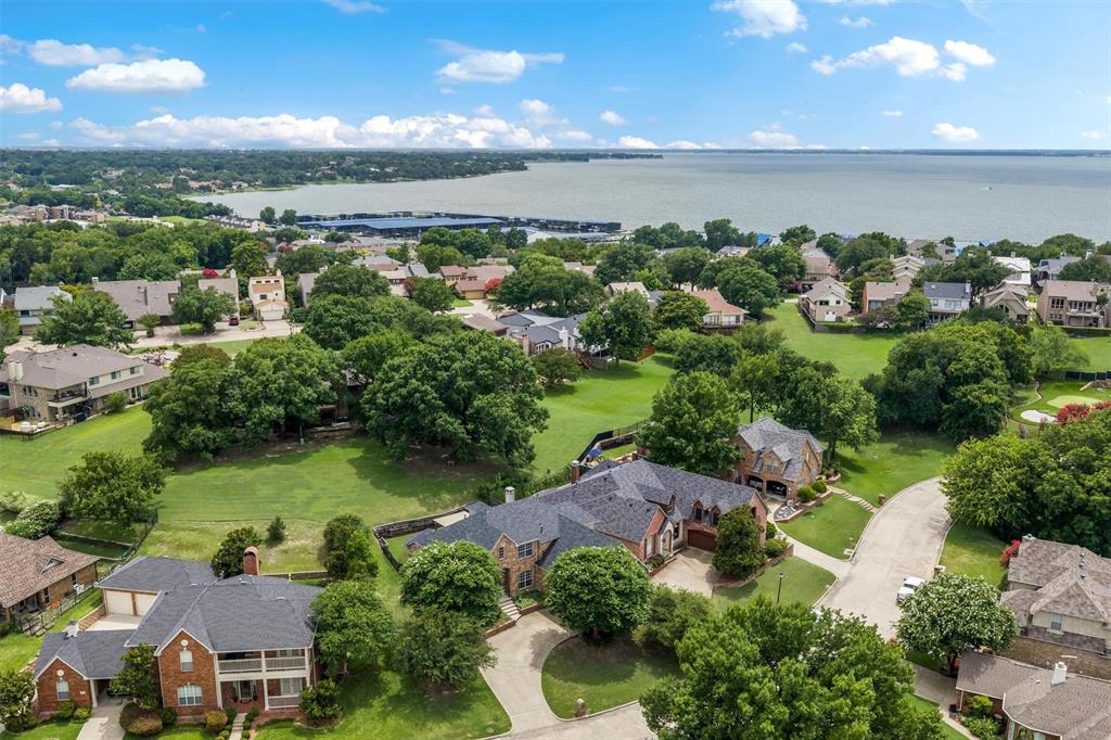 5607 Ranger Drive Rockwall, TX 75032 - Photo 3 of 40 Expansive aerial capturing a neighborhood with lake frontage