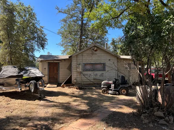 a room with a bed and a window