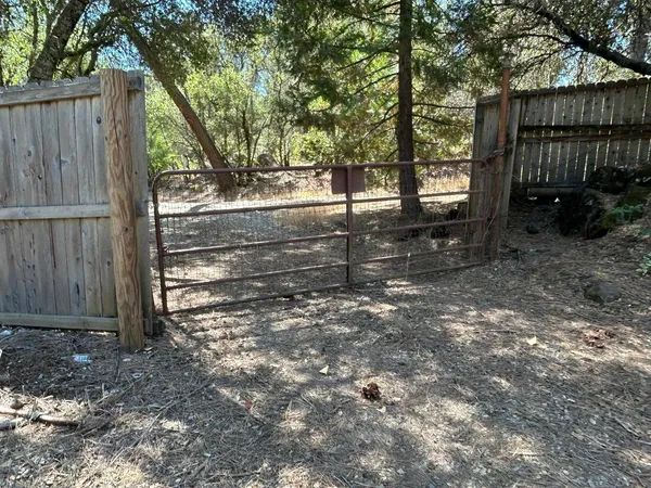 a view of an empty room with windows