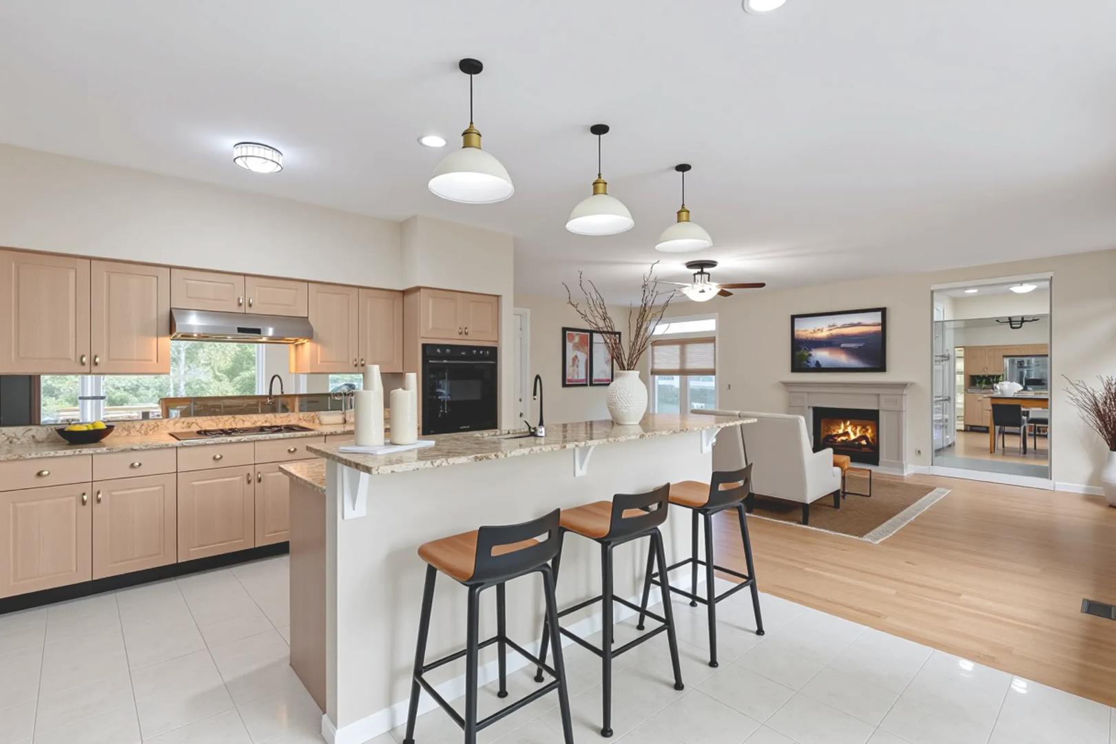 7623 Beringer Court Gurnee, IL 60031 - Photo 11 of 28 a kitchen with cabinets a sink and chairs