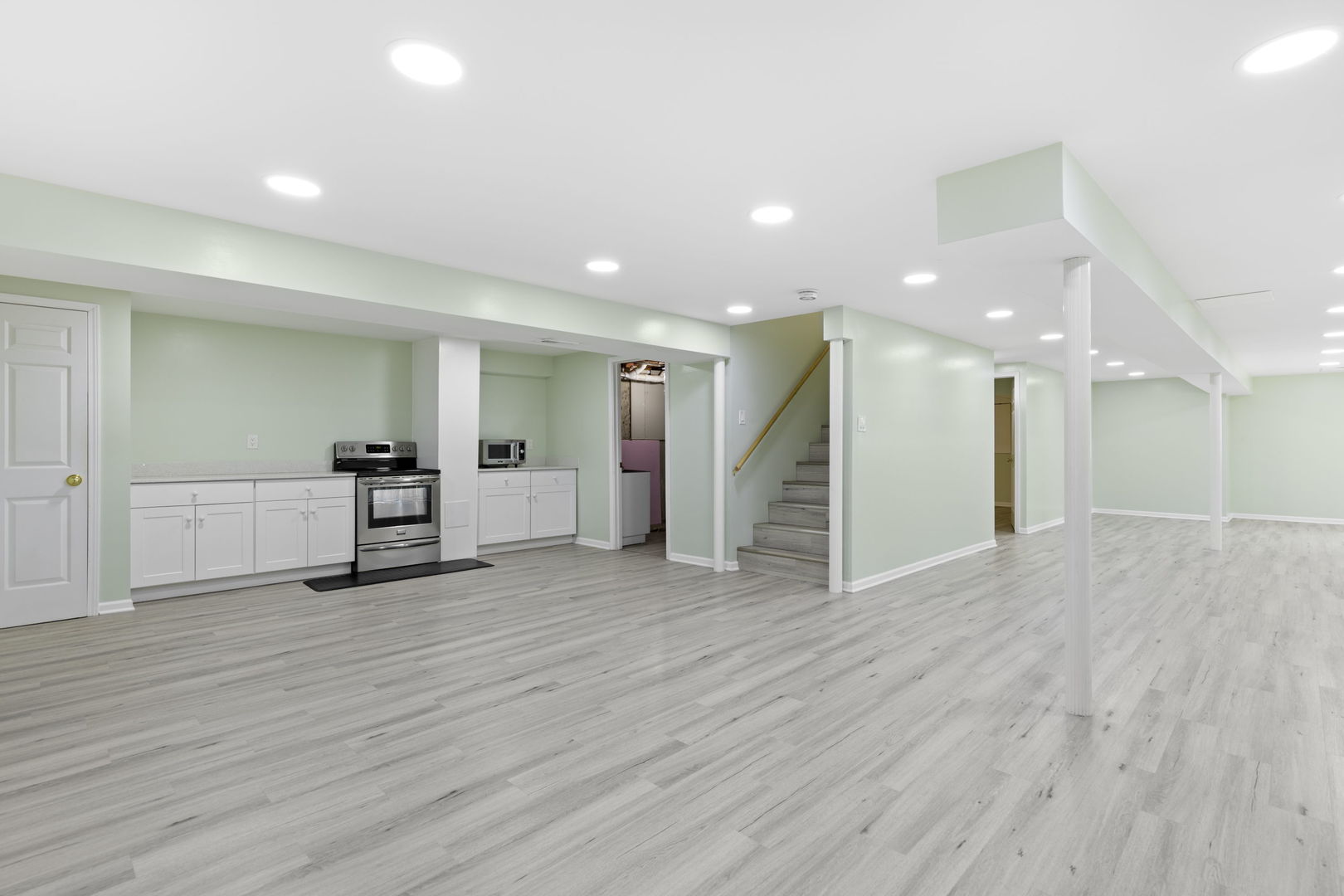 7623 Beringer Court Gurnee, IL 60031 - Photo 21 of 28 a view of an empty room with wooden floor