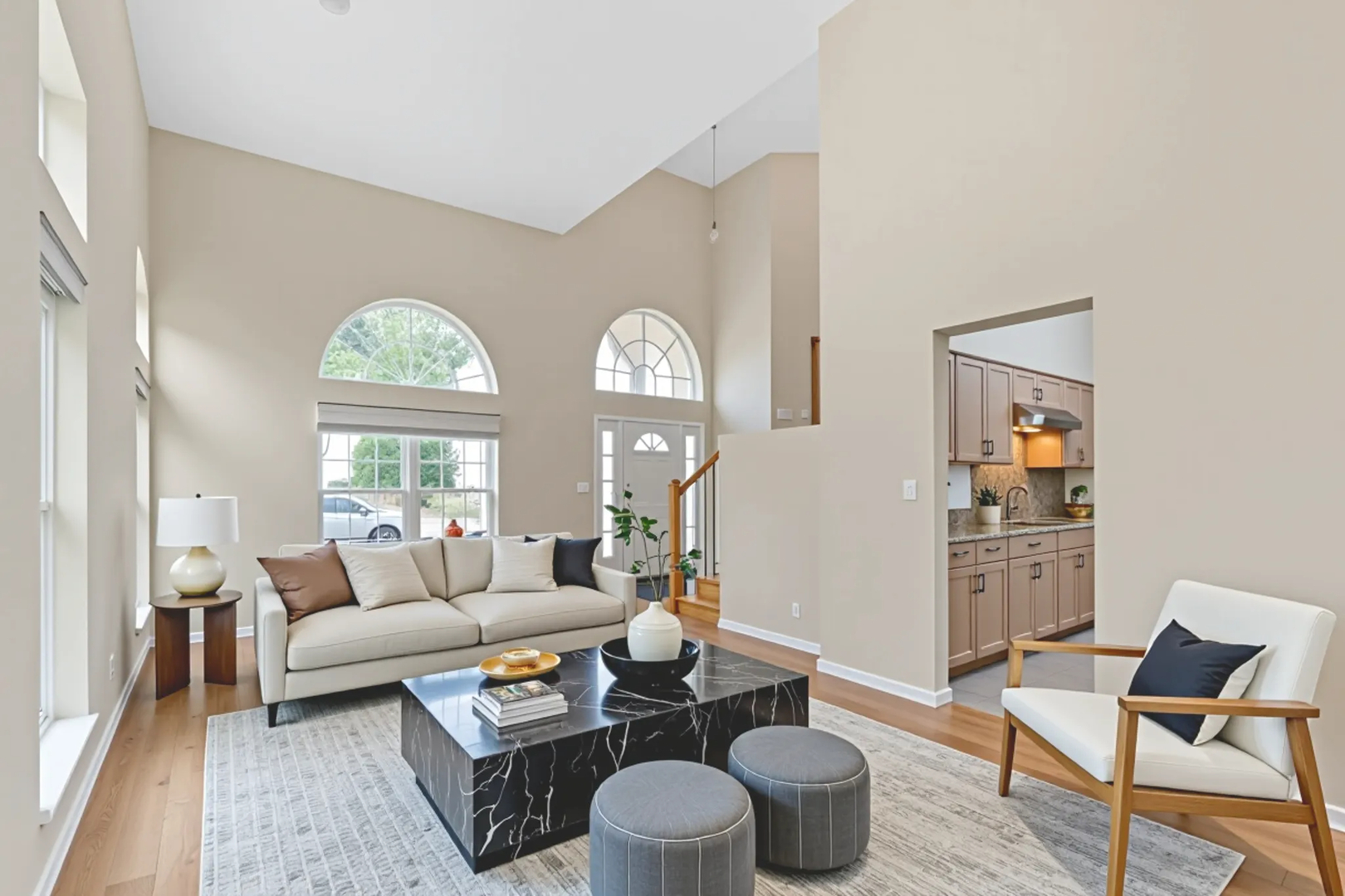 7623 Beringer Court Gurnee, IL 60031 - Photo 7 of 28 a living room with furniture and a large window
