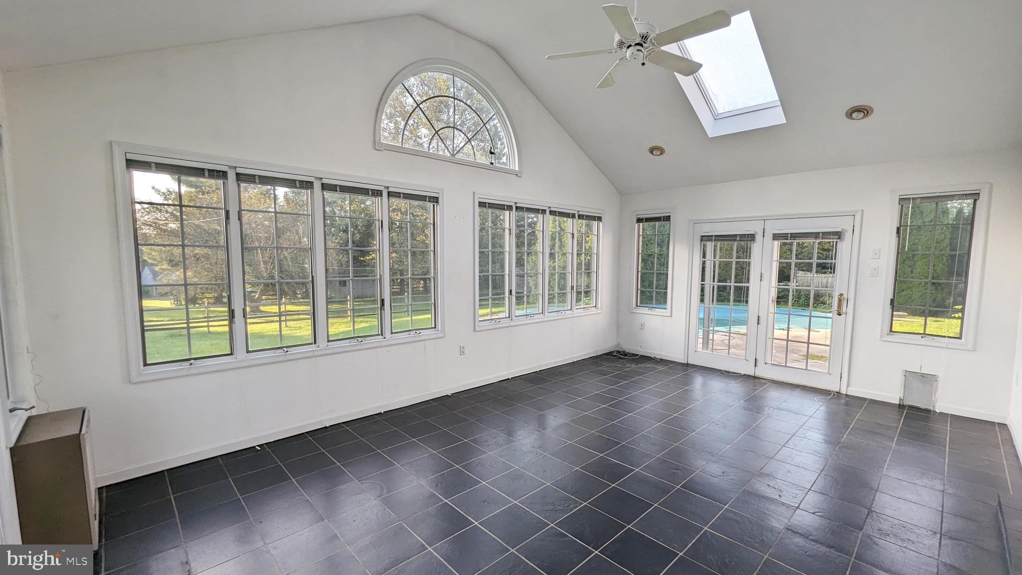 20 Valley View Drive Doylestown, PA 18901 - Photo 11 of 18 Sunroom with views of the pool and yard