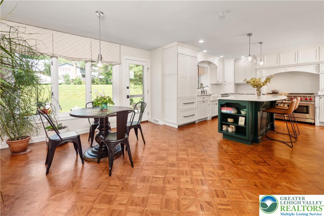 1588 Surrey Road Bethlehem, PA 18015 - Photo 18 of 50 a view of a dining room with furniture and chandelier