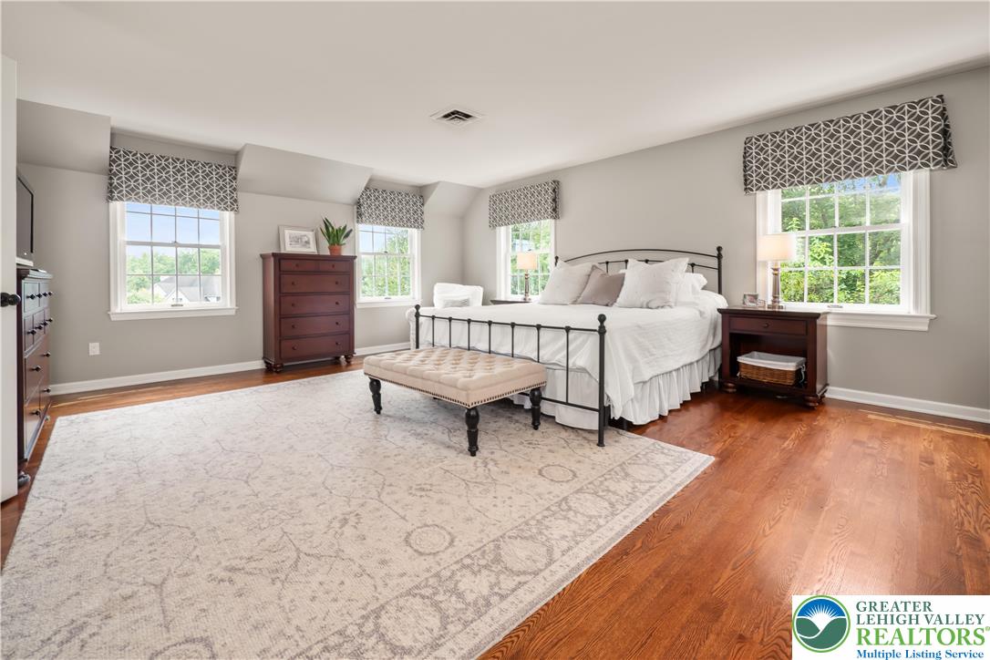1588 Surrey Road Bethlehem, PA 18015 - Photo 26 of 50 a bed room with a bed and a chair