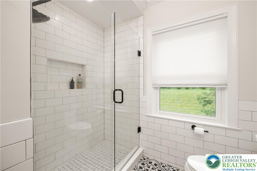 1588 Surrey Road Bethlehem, PA 18015 - Photo 36 of 50 a bathroom with a window and shower