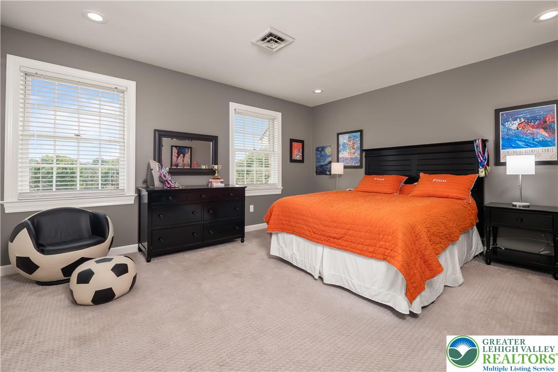 1588 Surrey Road Bethlehem, PA 18015 - Photo 37 of 50 a bedroom with a bed and a window