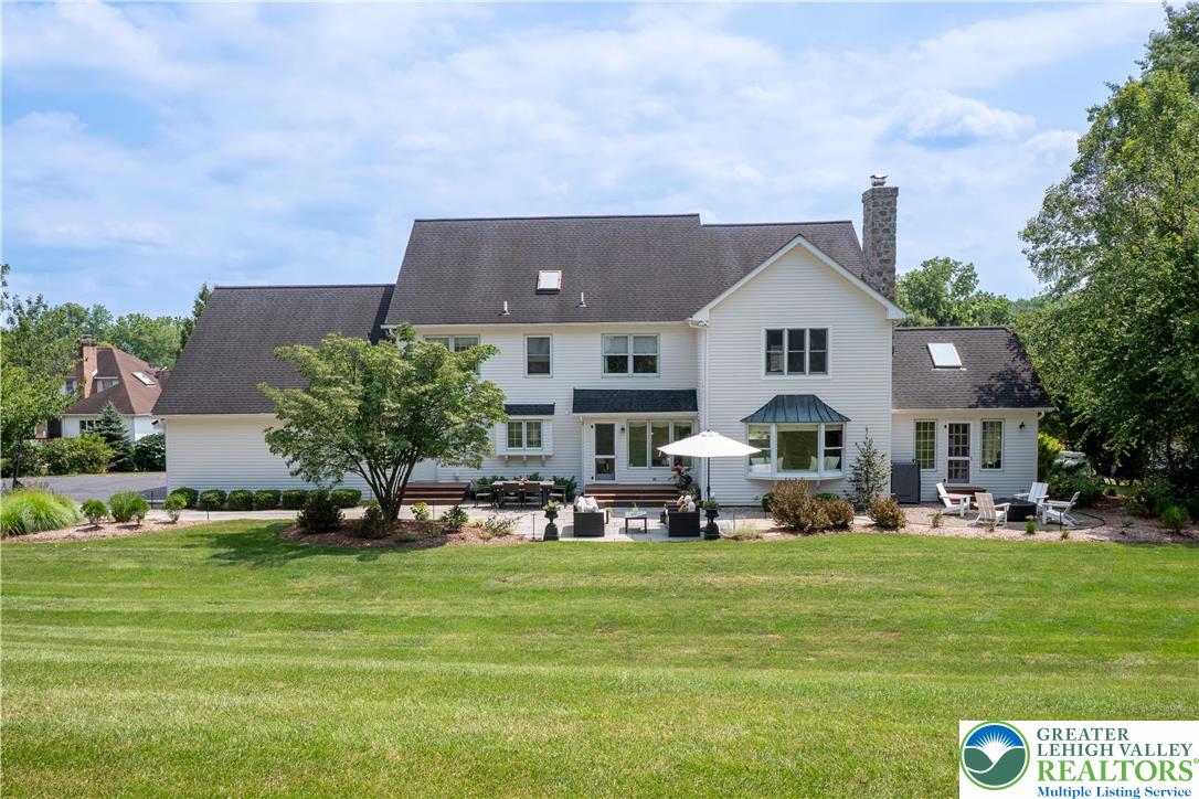 1588 Surrey Road Bethlehem, PA 18015 - Photo 4 of 50 a front view of a house with garden