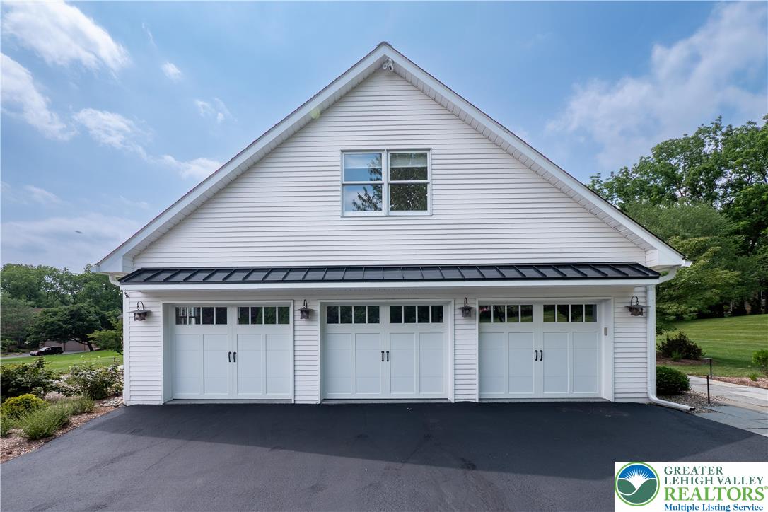 1588 Surrey Road Bethlehem, PA 18015 - Photo 5 of 50 a front view of a house with a yard