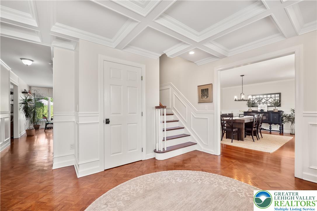 1588 Surrey Road Bethlehem, PA 18015 - Photo 6 of 50 a view of a hallway with wooden floor and staircase