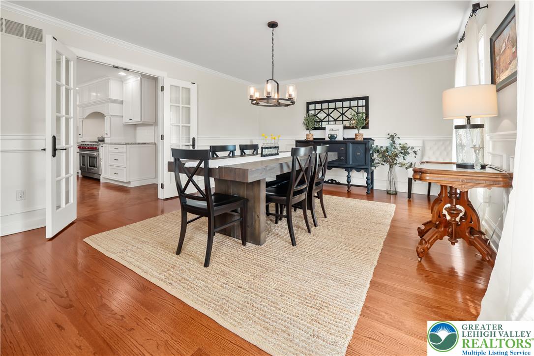 1588 Surrey Road Bethlehem, PA 18015 - Photo 7 of 50 a view of a dining room with furniture window and wooden floor