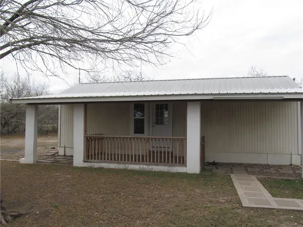 a view of a house with a roof deck