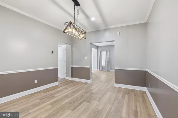 a kitchen with stainless steel appliances granite countertop a stove a sink and a granite counter tops